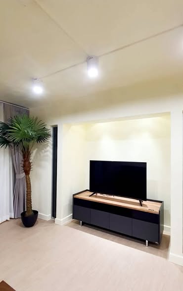 bedroom and room interior of Riviera Condominium