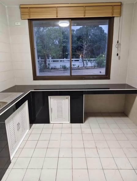 bathroom and kitchen of Royal Beach Condo