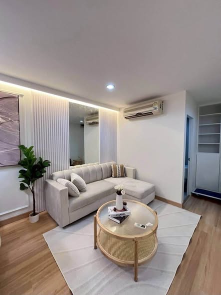 bedroom and living room of S Condo Sukhumvit 50