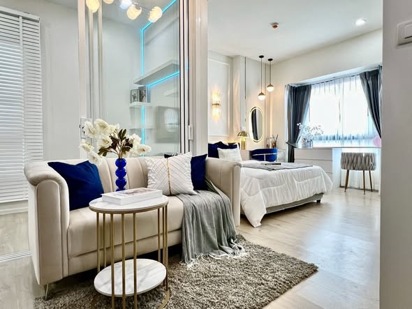 bedroom and living room of S1 Rama 9 Condominium