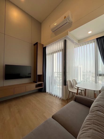 living room and bedroom of SIAMESE RAMA9 SITE OFFICE