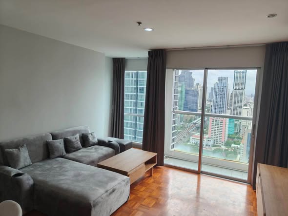 living room and bedroom of Silom Suite Condominium