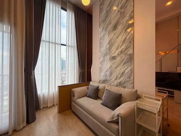 living room and bedroom of SOHO​ BANGKOK​ RATCHADA​