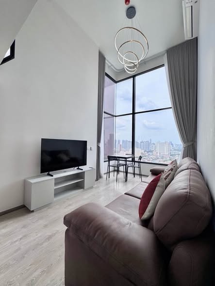 living room and bedroom of SOHO​ BANGKOK​ RATCHADA​