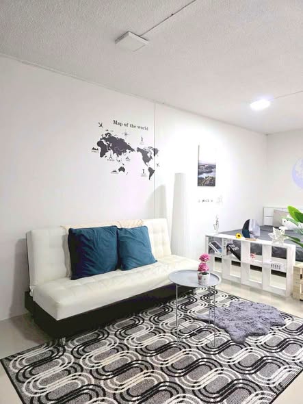 living room and bedroom of SR Complex condo