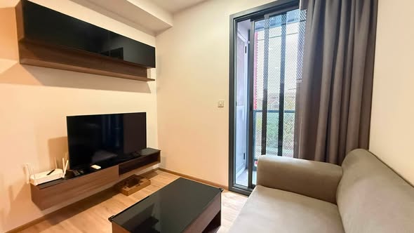 bedroom and living room of TAKA HAUS ทากะ เฮาส์
