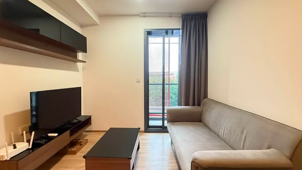 bedroom and living room of TAKA HAUS ทากะ เฮาส์
