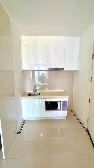 bathroom and kitchen of TC-Green Condominium