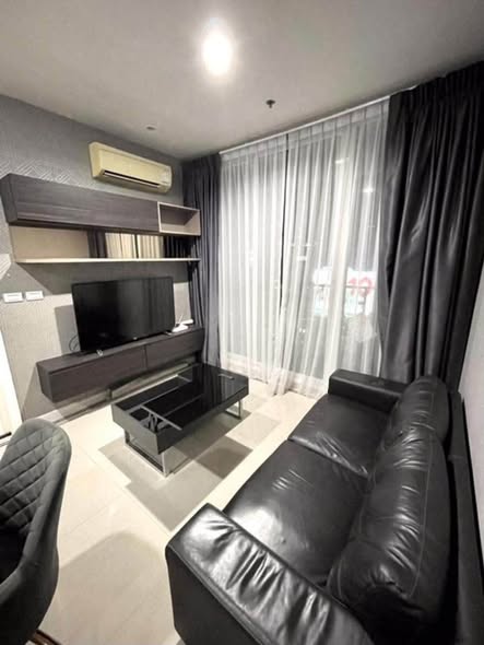 living room and bedroom of TC-Green Condominium