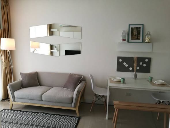 living room and bedroom of TC-Green Condominium