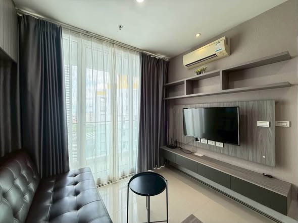 living room and bedroom of TC-Green Condominium