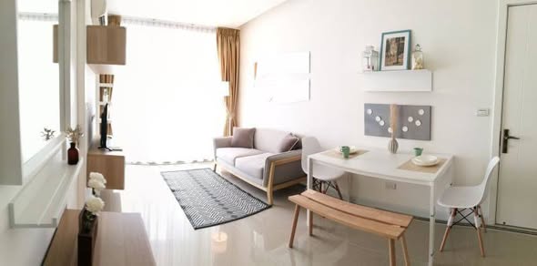 living room and bedroom of TC-Green Condominium