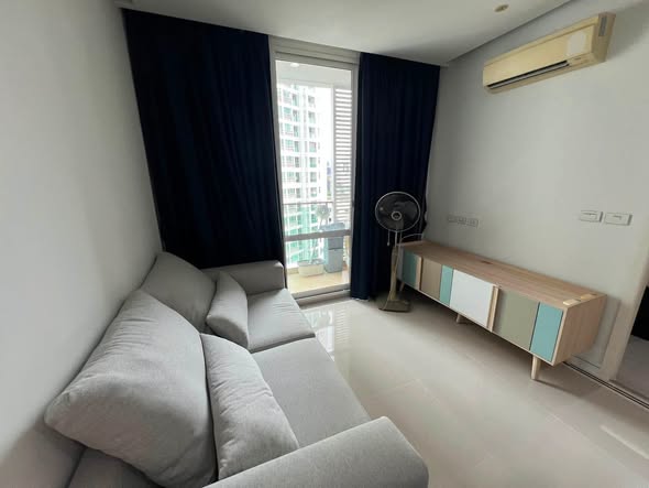 living room and bedroom of TC-Green Condominium
