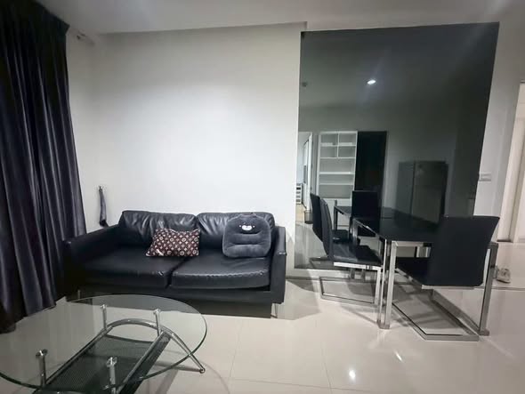 living room and bedroom of TC-Green Condominium