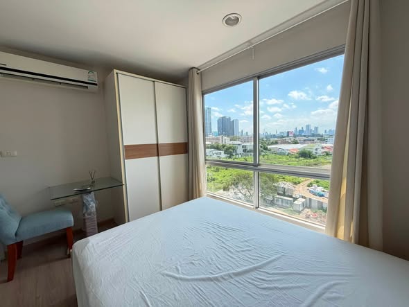 bedroom of Tempo One Condo