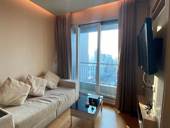 bedroom and living room of The Address Asoke