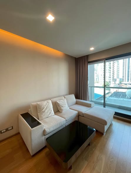 living room and bedroom of The Address Sathorn
