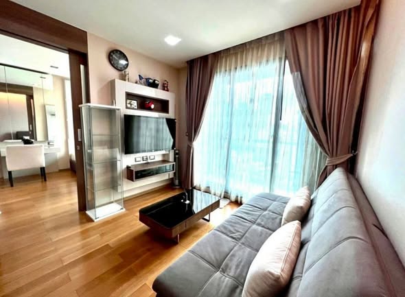 living room and bedroom of The Address Sathorn