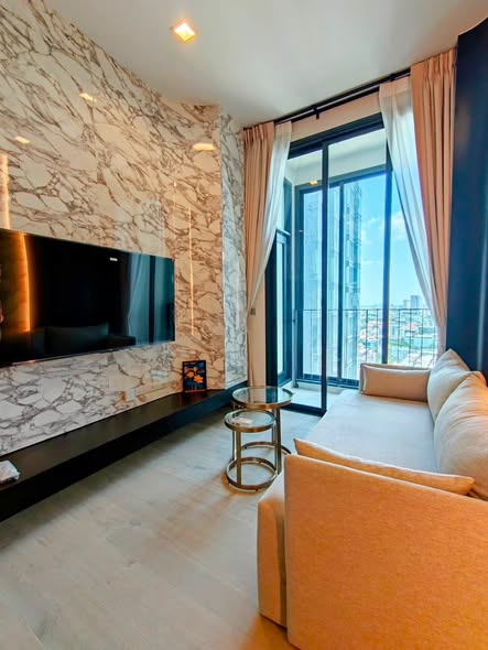 bedroom and living room of The Address Siam-Ratchathewi
