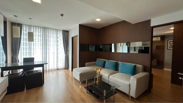 bedroom and living room of The Alcove Thonglor 10