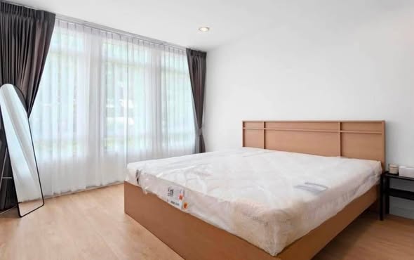 bedroom of The Amethyst 39 Condominium