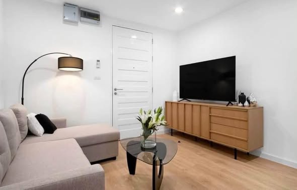 bedroom and living room of The Amethyst 39 Condominium