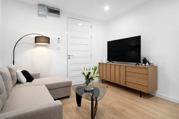 bedroom and living room of The Amethyst 39 Condominium