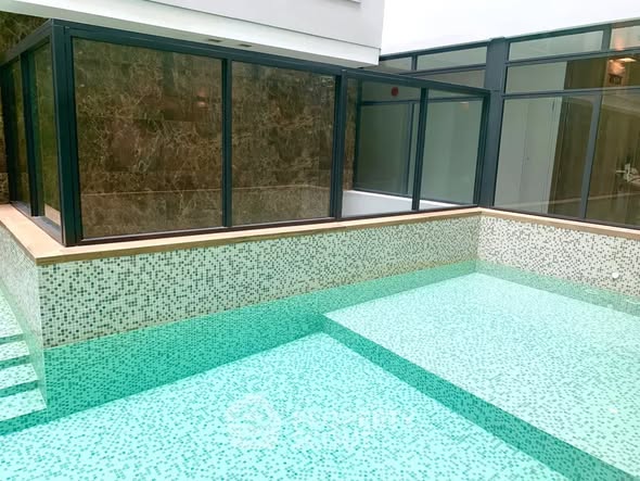 pool and room interior of The Bangkok Residence