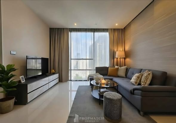 bedroom and living room of The Bangkok Sathorn