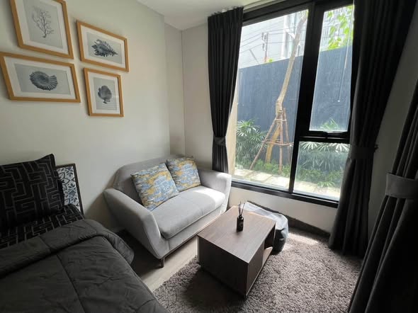 bedroom and living room of THE BASE Central – Phuket