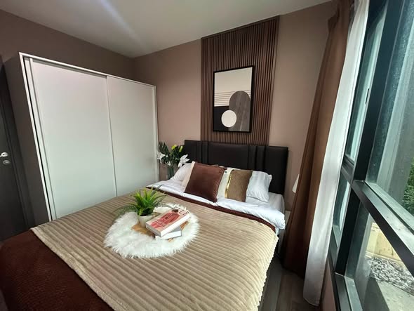 bedroom of THE BASE Park West – Sukhumvit 77