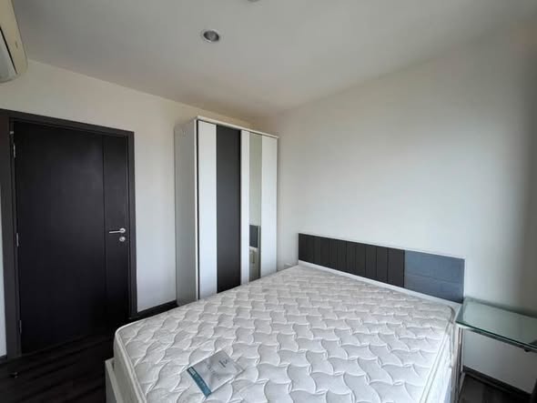 bedroom of THE BASE Park West – Sukhumvit 77