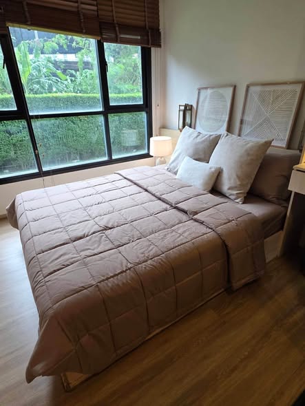 bedroom of THE BASE Park West – Sukhumvit 77