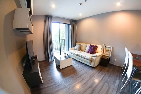 bedroom and living room of THE BASE Park West – Sukhumvit 77