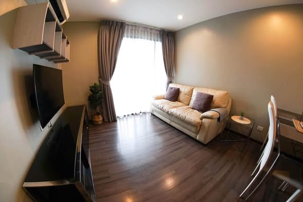 living room and bedroom of THE BASE Park West – Sukhumvit 77