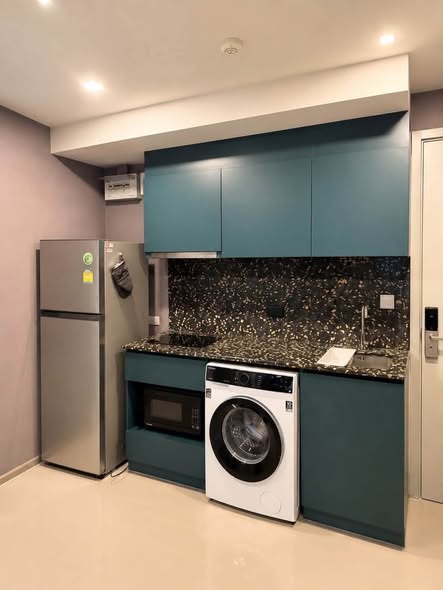 bathroom and kitchen of THE BASE Sukhumvit 50