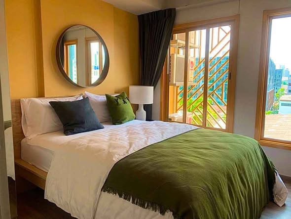 bedroom of THE BASE Sukhumvit 50