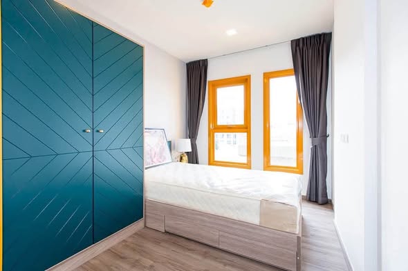 bedroom and room interior of THE BASE Sukhumvit 50