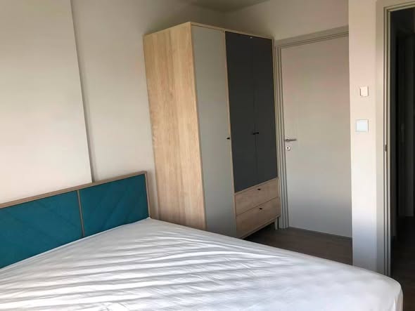 bedroom and room interior of THE BASE Sukhumvit 50