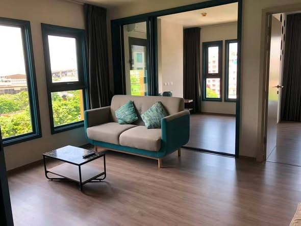 living room and room interior of THE BASE Sukhumvit 50