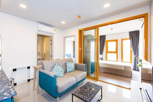 living room and room interior of THE BASE Sukhumvit 50