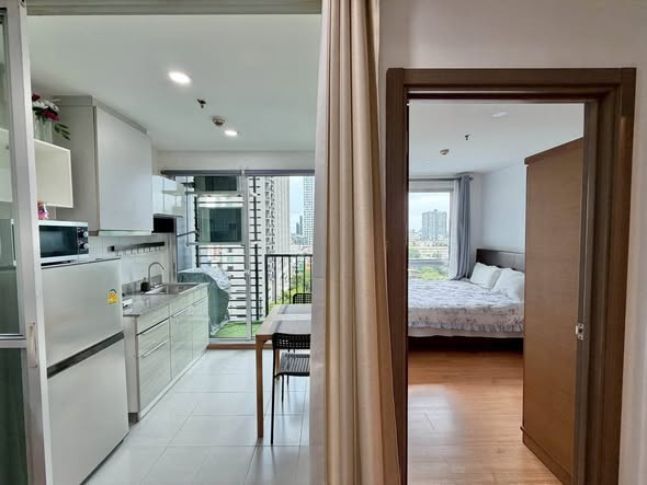 bedroom and room interior of THE BASE Sukhumvit 77