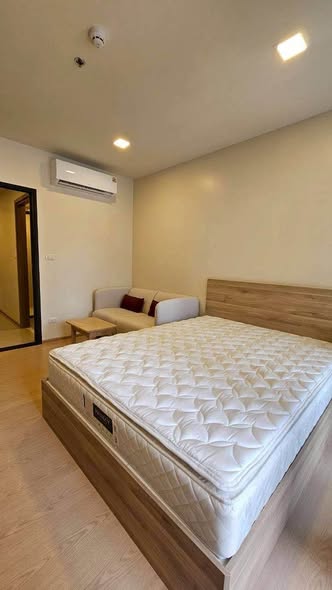 bedroom of The Base Urban Rama9