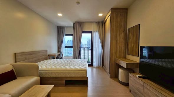 bedroom of The Base Urban Rama9