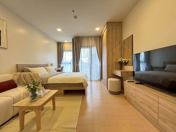 living room and bedroom of The Base Urban Rama9