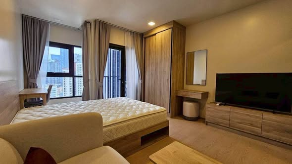 living room and bedroom of The Base Urban Rama9