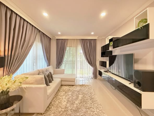 bedroom and living room of The City Ramintra