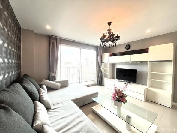 bedroom and living room of The Clover