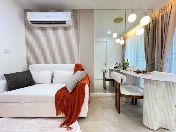 bedroom and living room of The Clover