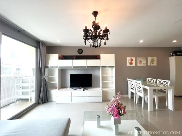 bedroom and living room of The Clover
